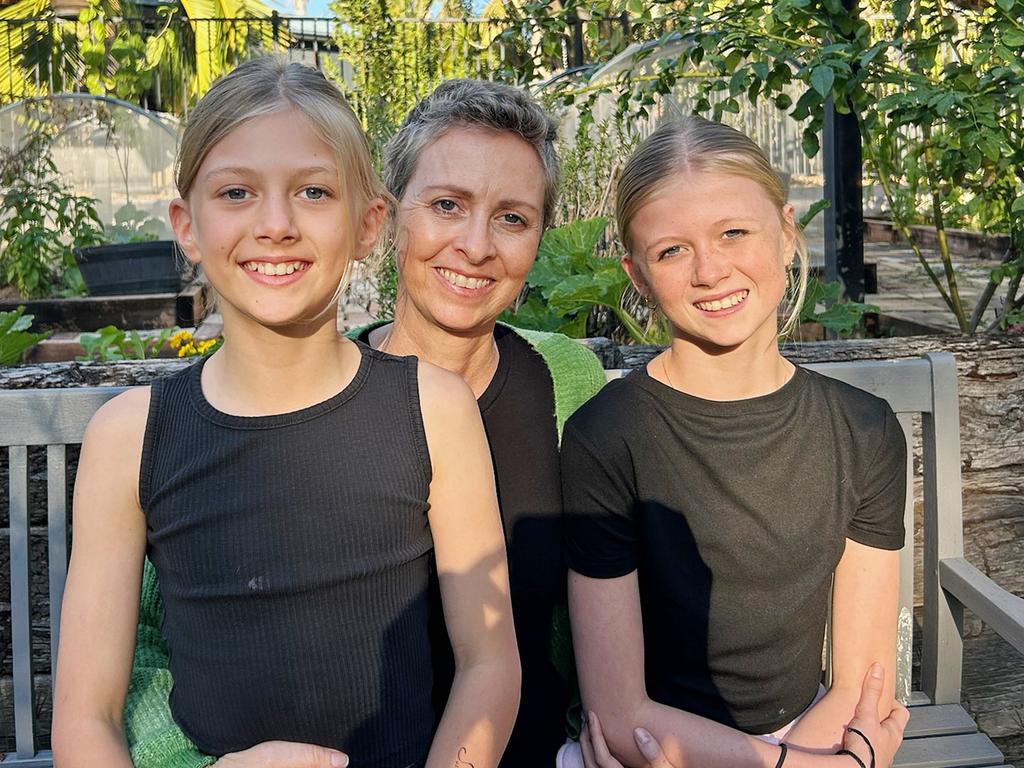 Breast cancer patient Sally Wallis with her daughters Holly and Matilda. Photo: Supplied.