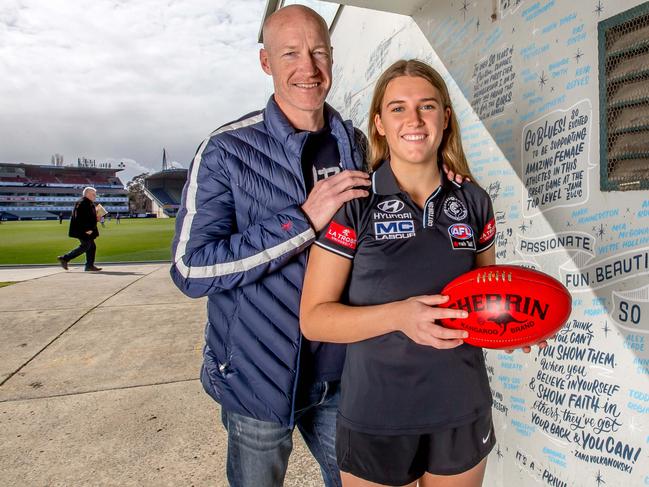 History will be made on Tuesday with football’s first father-daughter recruit Abbie McKay, pictured with dad, Carlton premiership player Andrew McKay. Picture: Tim Carrafa