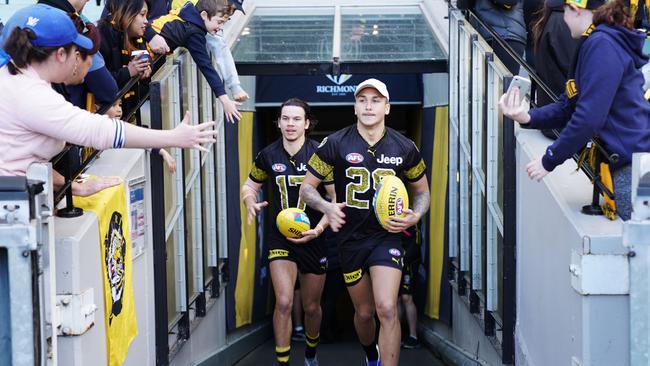 Rioli and Bolton before a Tigers’ game at the MCG. Picture: Getty