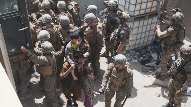 US Marines and Norwegian coalition forces ensuring evacuees are processed safely at Kabul airport in Afghanistan. Picture: Staff Sgt. Victor Mancilla/US Marine Corps/Getty Images