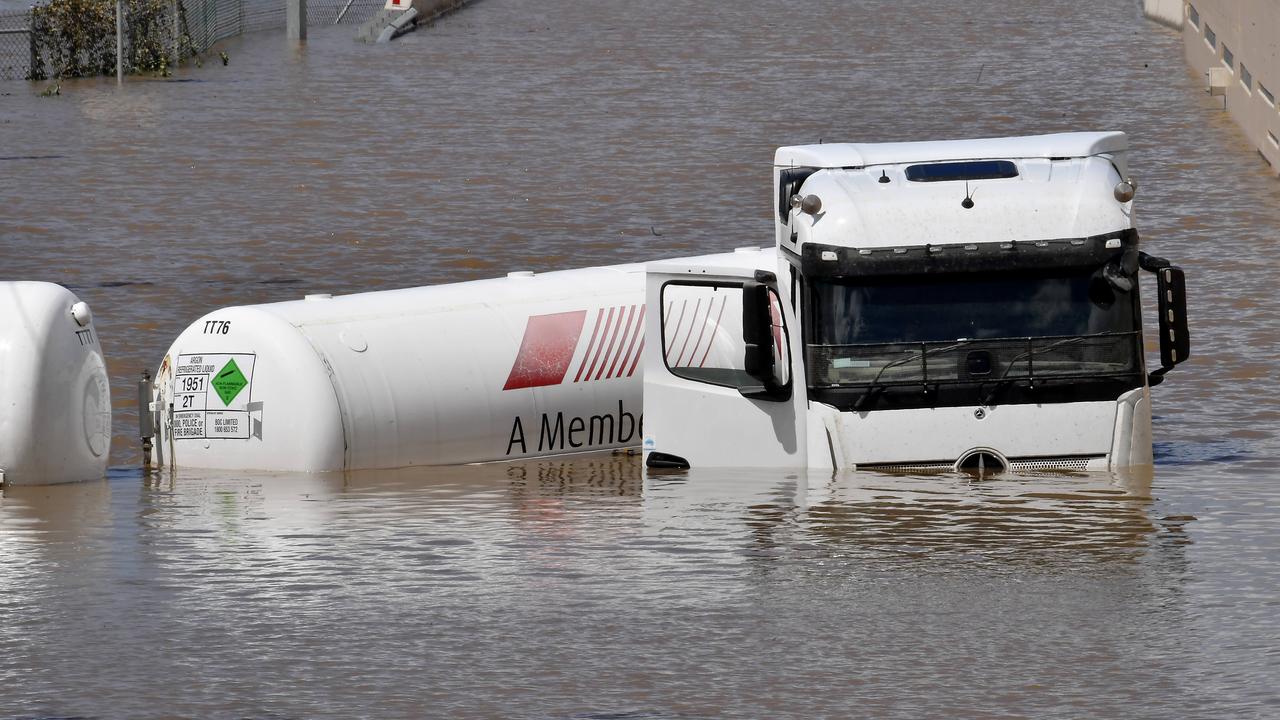 Brisbane, which received more than three quarters of the rainfall it would normally get over the whole year, remained a mess of confusion and chaos nearly a week later as road closures, ongoing power outages, and the threat of more water stymied clean-up efforts. Picture: NCA NewsWire / John Gass