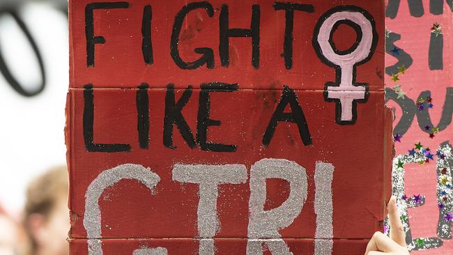 One of the signs at Melbourne’s International Women's day rally. Picture: AAP