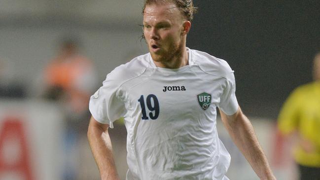 SEOUL, SOUTH KOREA - JUNE 11: Vitaliy Denisov of Uzbekistan in action during the FIFA World Cup qualifier match between South Korea and Uzbekistan at Seoul World Cup Stadium on June 11, 2013 in Seoul, South Korea. (Photo by Atsushi Tomura/Getty Images)