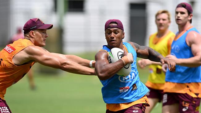 Tesi Niu takes on a break during a Brisbane Broncos training session. Picture: Bradley Kanaris/Getty Images