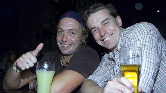 Brett Hartin and Steve Harrison... this time with shirts on... at the Breakfast Creek Hotel in 2003. Picture: Adam Smith