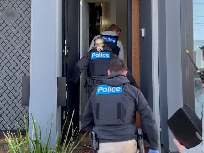 Police raid the Frankston home. Picture: Victoria Police