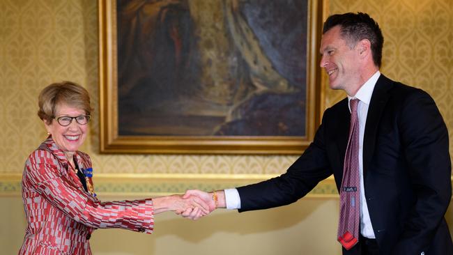 NSW Premier Chris Minns was seen wearing a threaded red and yellow bracelet on Tuesday when he was sworn in by NSW Governor Margaret Beazley. Picture: AAP Image/Dan Himbrechts/ POOL.