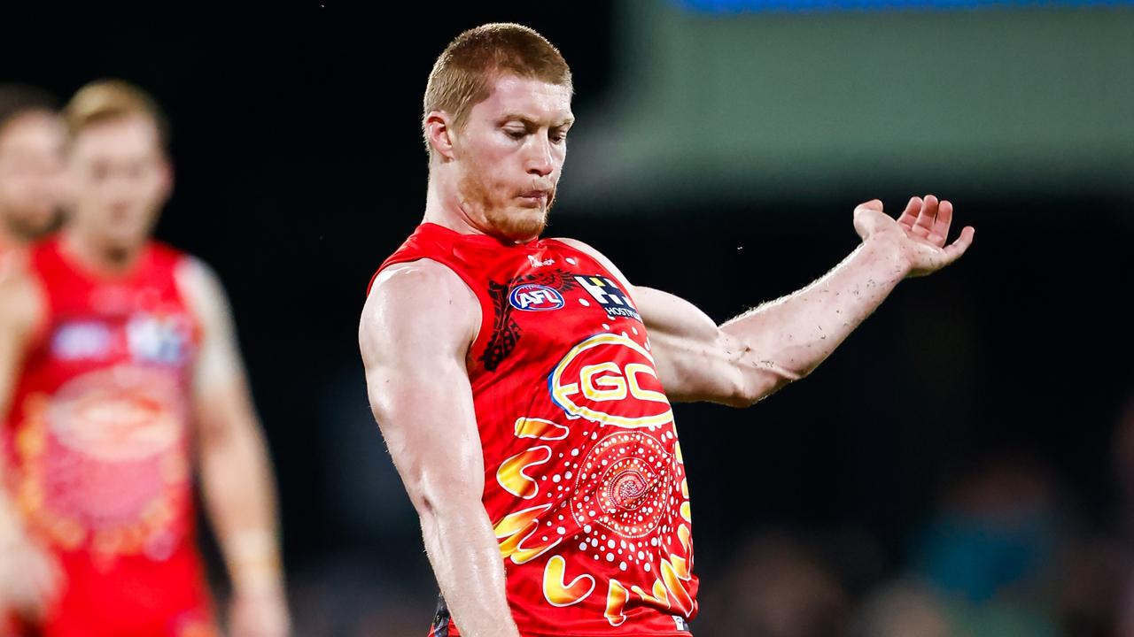 The Suns leave the field after a win during the 2023 AFL Round 12 News  Photo - Getty Images