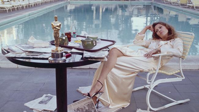 The famous picture of Faye Dunaway on March 29, 1977, at the Beverley Hills Hotel. It was the day after she won the Oscar for Best Actress in a Leading Role for Network. Picture: Terry O'Neill/Iconic Images/Getty Images.