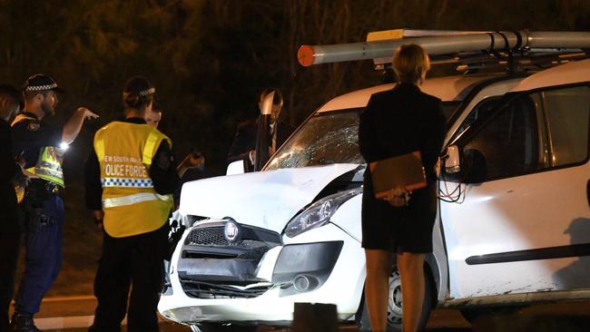 The crash scene that saw two officers allegedly struck by the van. Picture: Gordon McComiskie