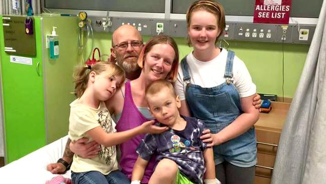 Oshin and family - with parents Angela Kiszko and Adrian Strachan. Picture: GoFundMe