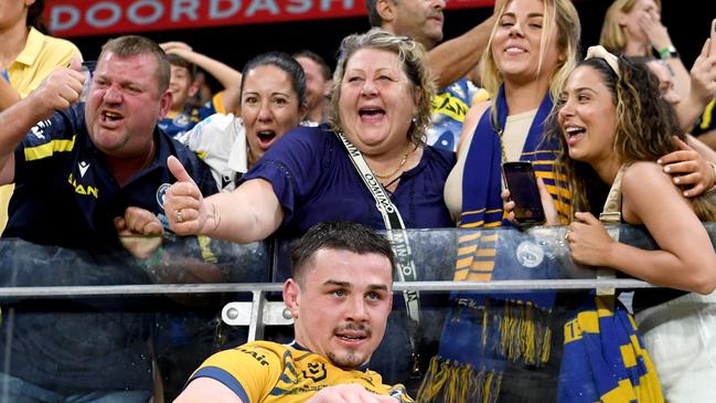 Reed Mahoney is cheered by mum Leanne and other Eels fans in Townsville on Friday night. Picture: NRL Photos