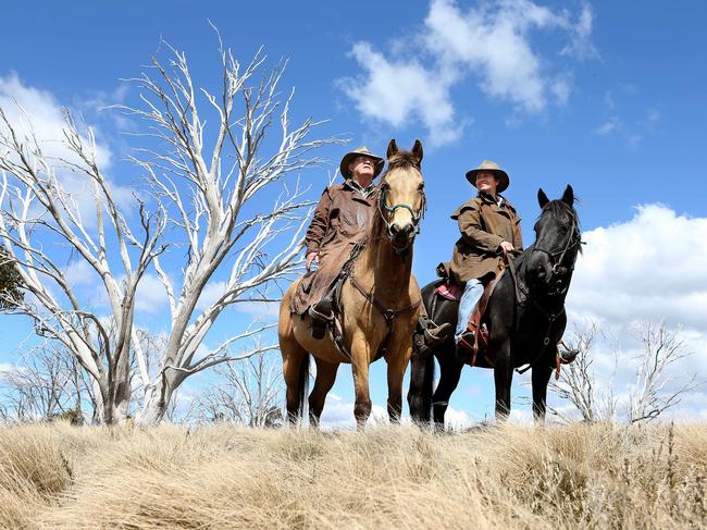 Peter Cochran and Bec Atkinson from Cochran Horse Treks taking a ride through the national park. Picture: Stephen Cooper