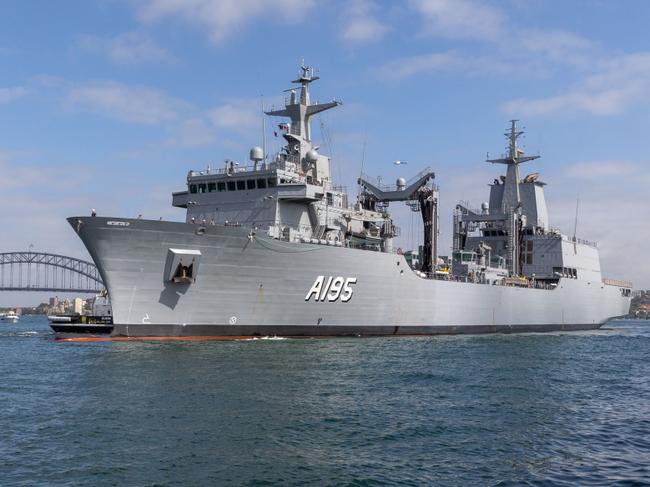 NUSHIP Supply arrives at her home port for the first time, at Fleet Base East, Sydney, New South Wales. *** Local Caption *** Auxiliary Oiler Replenishment (AOR) ship, NUSHIP Supply arrived at her home port for the first time, at Fleet Base East in Sydney, New South Wales, on 15 January 2021.   NUSHIPÂ SupplyÂ (II) is the lead ship of two Supply Class Auxiliary Oiler Replenishment (AOR) ships currently being built for the Royal Australian Navy by Spanish shipbuilder, Navantia. The Australian Supply Class ships are based on the Spanish Navy's Cantabria Class design.  The ships are intended to carry fuel, dry cargo, water, food, ammunition, equipment and spare parts to provide operational support for the deployed naval or combat forces operating far from the port on the high seas for longer periods.  In addition to replenishment, the vessels can be used to combat against environmental pollution at sea, provide logistics support for the armed forces, and to support humanitarian and disaster relief (HADR) operations following a natural disaster.  NUSHIPÂ SupplyÂ was laid down on 18 November 2017 and then launched at the Navantia Shipyards in Ferrol, Spain on 24 November 2018.  NUSHIPÂ SupplyÂ is the second Royal Australian Navy ship to bear the name after the Tide Class Fleet Tanker,Â HMAS Supply (I).  On 2 October 2020,  NUSHIPÂ SupplyÂ arrived at Fleet Base West, Western Australia for final fit-out and testing activities. Ship acceptance by the Department of Defence occurred on 8 January 2021. HMASÂ SupplyÂ is scheduled to enter Royal Australian Navy service in 2021.