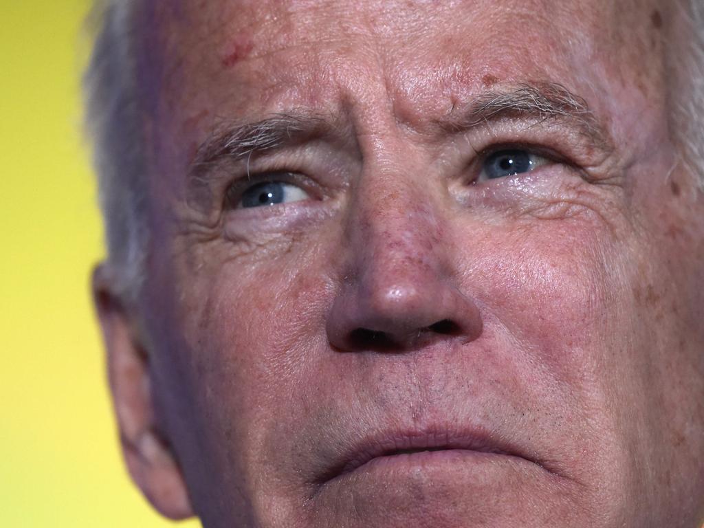 Joe Biden did not embrace Donald Trump’s Twitter defence of him but instead criticised him for pardoning a soldier convicted of murder. Picture: AFP