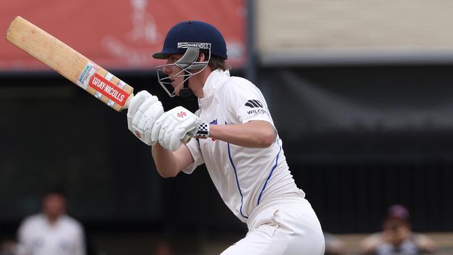 Ryan Metz of Keilor watches his shot. Photo: Hamish Blair