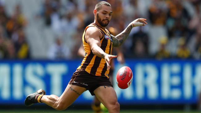 MELBOURNE, AUSTRALIA - MARCH 28: Jarman Impey of the Hawks kicks the ball during the 2021 AFL Round 02 match between the Hawthorn Hawks and the Richmond Tigers at the Melbourne Cricket Ground on March 28, 2021 in Melbourne, Australia. (Photo by Michael Willson/AFL Photos via Getty Images)