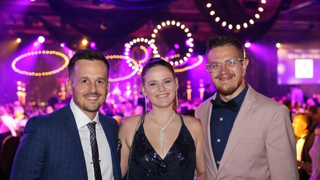 Chris Blackburn, Maddie Holden Smith and Kayla Current at the Gold Coast Business Excellence Awards Gala 2023 at The Star Gold Coast. Picture: Portia Large