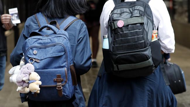 GENERIC AUSTRALIAN STUDENTS - BACK VIEW -  SYDNEY, AUSTRALIA - NewsWire Photos MAY 4, 2021: Students travel home after school. Picture: NCA NewsWire / Nikki Short