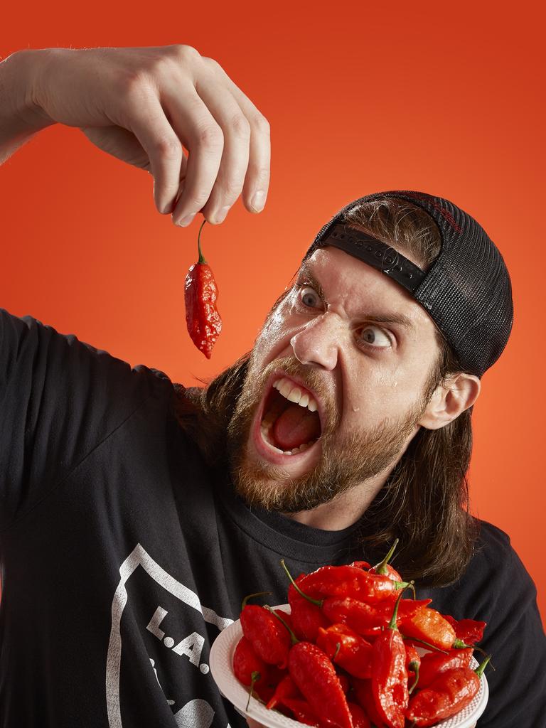 Kevin Strahle - Most Bhut Jolokia chilli peppers eaten in 2 mins. Picture: Kevin Scott Ramos/Guinness World Records