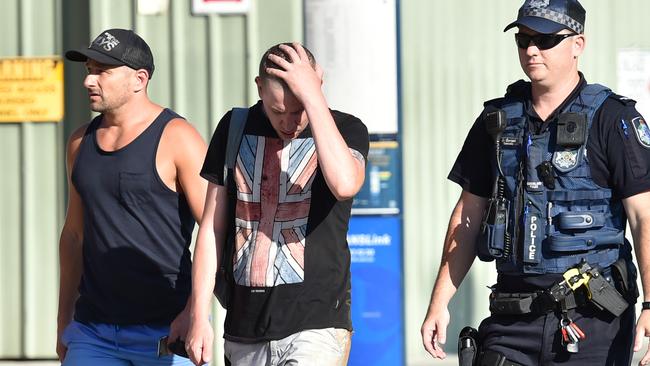 A distressed David Turner leaves Dreamworld hours after the disaster which killed his partner Kate Goodchild. Picture: NIGEL HALLETT