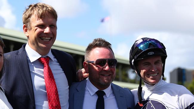 Bjorn Baker, syndicator Scott Darby (centre) and jockey Josh Parr celebrate the win of Caballus in the Group 3 Eskimo Prince Stakes. Picture: Getty Images