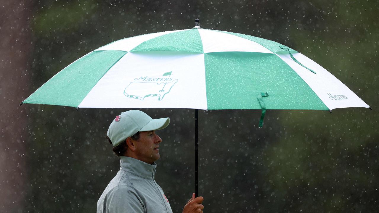 Adam Scott, like many Australians, copped the worst of the weather at Augusta. Picture: AFP