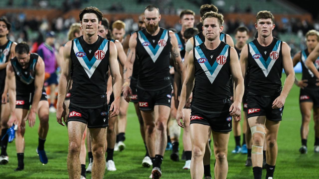 ADELAIDE, AUSTRALIA - SEPTEMBER 05: Port Adelaide leave the ground after losing the AFL Second Qualifying Final match between Port Adelaide Power and Geelong Cats at Adelaide Oval, on September 05, 2024, in Adelaide, Australia. (Photo by Mark Brake/Getty Images)