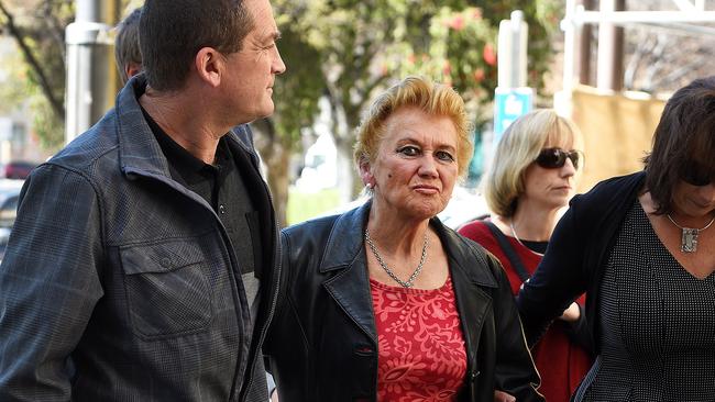 Trevor Bird’s partner Timea Dixon (centre) with family outside the District Court.