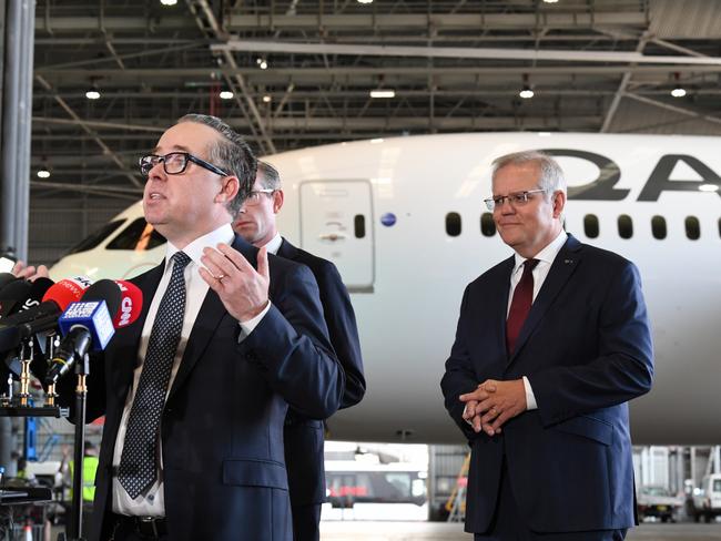 Alan Joyce, CEO of Qantas, with the Prime Minister Scott Morrison.