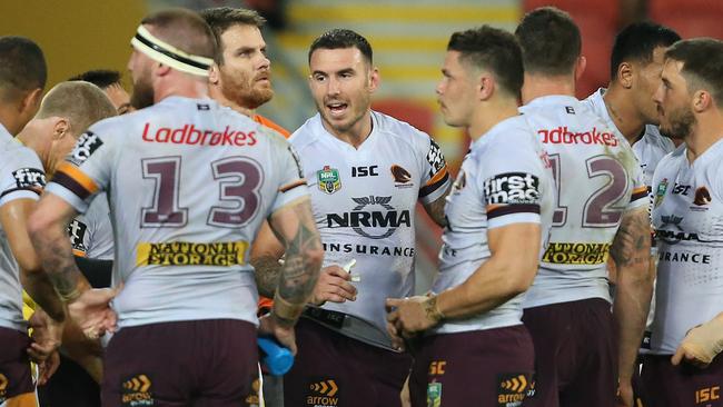 Darius Boyd of the Broncos talks to his teammates during the round 25 NRL game between the Brisbane Broncos and the Parramatta Eels at Suncorp Stadium in Brisbane, Thursday, August 24, 2017. (AAP Image/Jono Searle) NO ARCHIVING, EDITORIAL USE ONLY