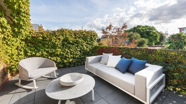 A cosy and private rooftop terrace, one of three outdoor areas.