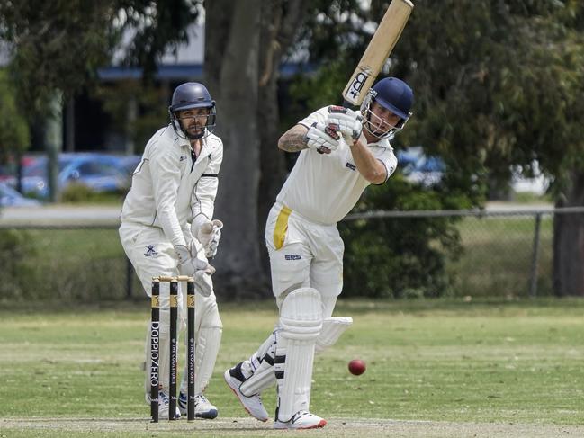 Dandenong District CA cricket: Buckley Ridges v Narre South. Ridges keeper Troy Aust and Narre South batsman Kyle Hardy. Picture: Valeriu Campan