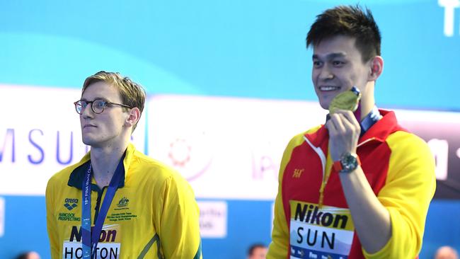 GWANGJU, SOUTH KOREA - JULY 21: (L-R Silver medalist Mack Horton of Australia and gold medalist Sun Yang of China competes in the *** on day one of the Gwangju 2019 FINA World Championships at Nambu International Aquatics Centre on July 21, 2019 in Gwangju, South Korea. (Photo by Quinn Rooney/Getty Images)