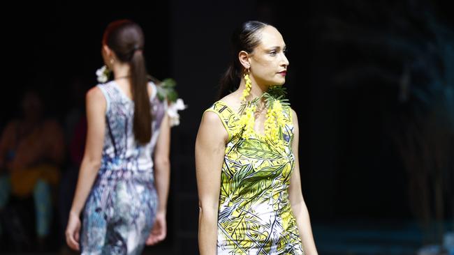 Tanika Parker showcases the Green Love collection from designer Bernard Singleton at the Cairns Indigenous Art Fair fashion performance, Woven, held at the Tanks Arts Centre, Edge Hill. Picture: Brendan Radke