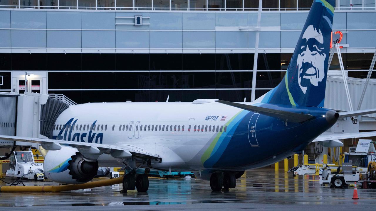 An Alaska Airlines Boeing 737 MAX-9 plane sits at a gate at Seattle-Tacoma International Airport on January 6 after the airline grounded its 737 MAX-9 planes. Picture: Stephen Brashear/Getty Images/AFP