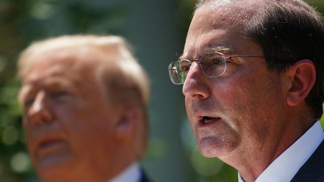 US secretary of Health and Human Services Alex Azar, right, speaks alongside President Donald Trump in the White House Rose Garden. Mr Azar will lead the US’s ‘highest level’ visit in decades to Taiwan. Picture: Mandel Ngan/AFP