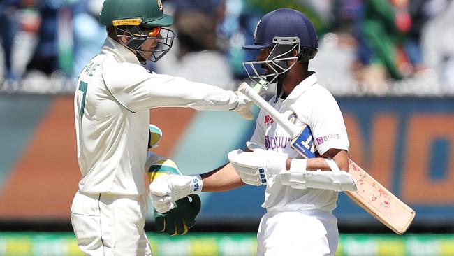 Australian captain Tim Paine says well done to Ajinkya Rahane after the Indian captain hit the winning runs at the MCG Pic: Michael Klein