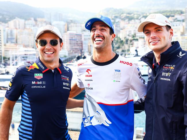 MONTE-CARLO, MONACO - MAY 23: Sergio Perez of Mexico and Oracle Red Bull Racing, Daniel Ricciardo of Australia and Visa Cash App RB and Max Verstappen of the Netherlands and Oracle Red Bull Racing pose for a photo in the Paddock during previews ahead of the F1 Grand Prix of Monaco at Circuit de Monaco on May 23, 2024 in Monte-Carlo, Monaco. (Photo by Mark Thompson/Getty Images)