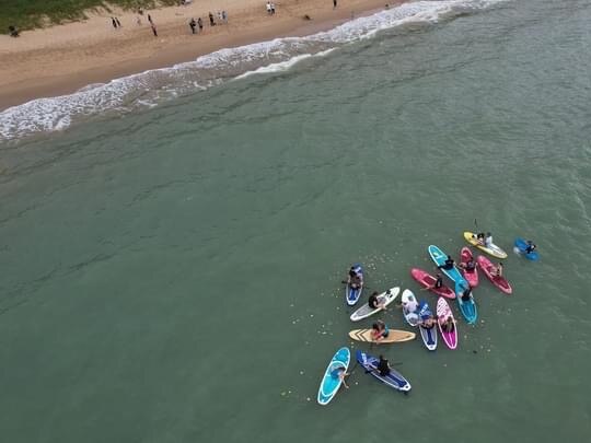 An aerial view of the paddle out.