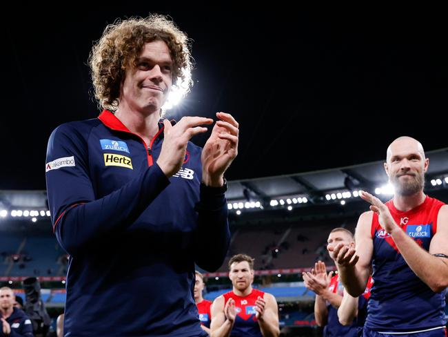 MELBOURNE, AUSTRALIA - AUGUST 23: The Demons form a guard of honour for retiree Ben Brown during the 2024 AFL Round 24 match between the Melbourne Demons and the Collingwood Magpies at The Melbourne Cricket Ground on August 23, 2024 in Melbourne, Australia. (Photo by Dylan Burns/AFL Photos via Getty Images)