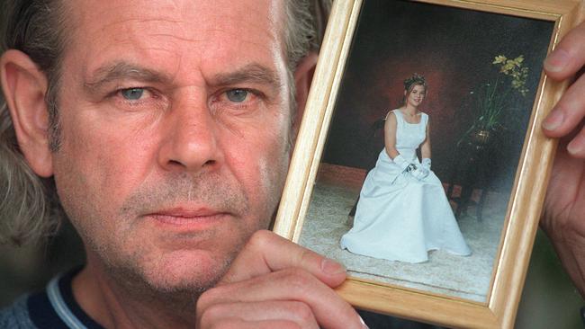 Alan Horan with a photo of his daughter Alisha.