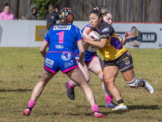 Natalia Webb for Gatton tackled by Amanda Hinch and Taylah Ebzery for Newtown. Womens Presidents Cup 2022. Sunday, July 3, 2022. Picture: Nev Madsen.