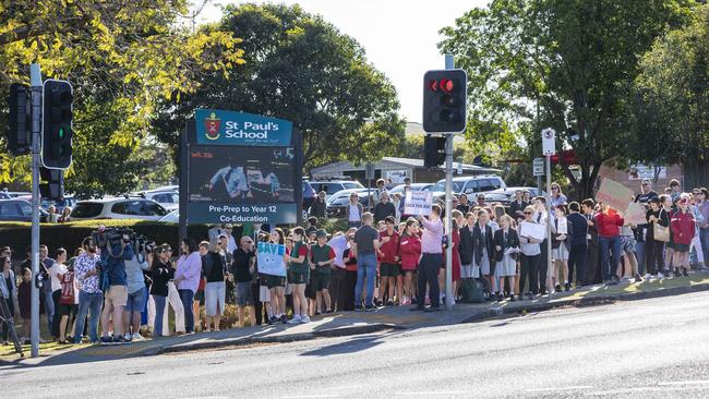 Hundreds of students and parents protesting outside St Paul’s School after principal Paul Browning was sacked.