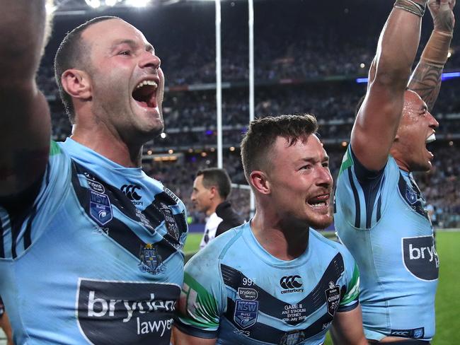 The NSW Blues celebrate winning the State of Origin series after defeating Queensland in Game 3 at ANZ Stadium, July 10, 2019. Boyd Cordner, Damien Cook and Tyson Frizell. Picture. Phil Hillyard