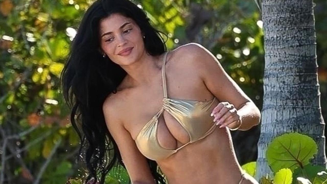 Kylie Jenner stuns in revealing gold bikini