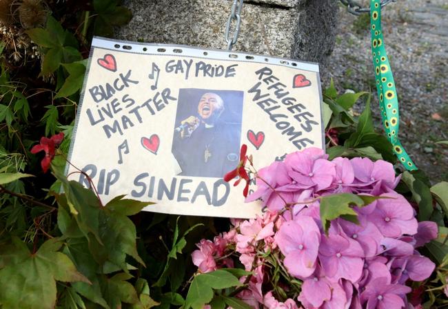 Flowers and tributes  outside her former home in Bray