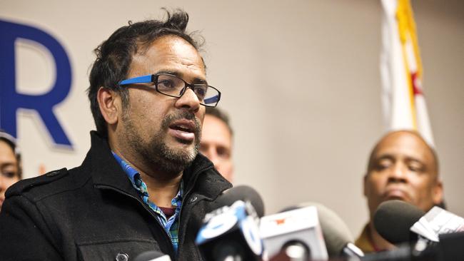 Devastated ... Farhan Khan, brother-in-law of Syed Farook, addresses the public. Picture: Matt Masin/The Orange County Register via AP