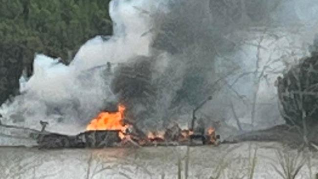 Watch: Boat destroyed by fire moored in the Mary River