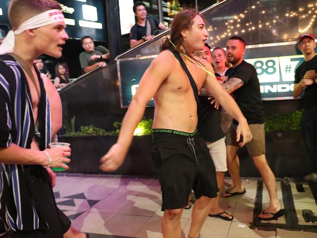 There’s no holding back these blokes during schoolies. Picture: Liam Kidston